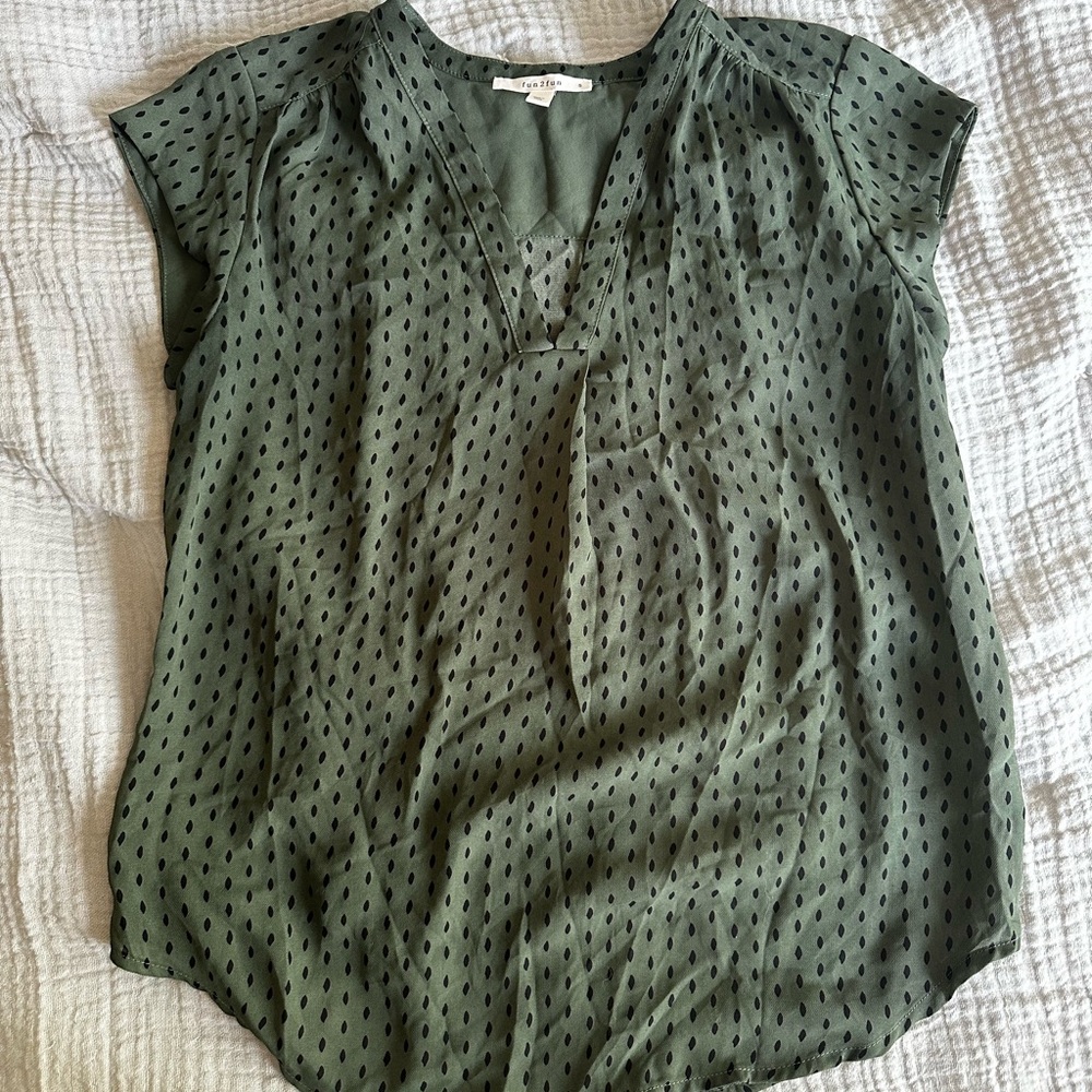 Green polka dot blouse